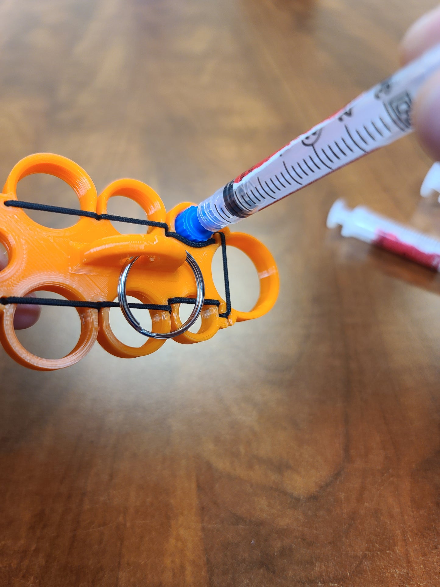 Knuckle Syringe Holder